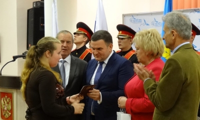 Первый паспорт – в День государственного флага